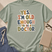 Alternate view of the 'Yes, I'm Old Enough to Be a Doctor' garment-dyed t-shirt in the Blossom colorway.