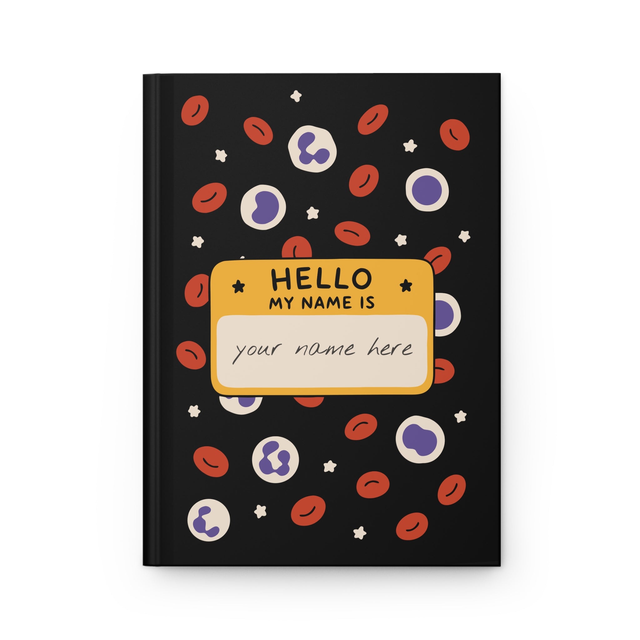 Black hardcover journal front cover with red and white blood cells and a yellow 'HELLO MY NAME IS' name tag reading 'your name here'