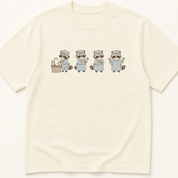 Garment-dyed unisex t-shirt featuring an illustrated Scrubbing In Raccoon design — Nursing humor tee for Surgery and Surgical Technology professionals.