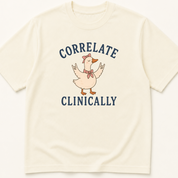 Garment-dyed unisex t-shirt printed with 'Correlate Clinically' — Pathology humor tee for Radiology professionals.