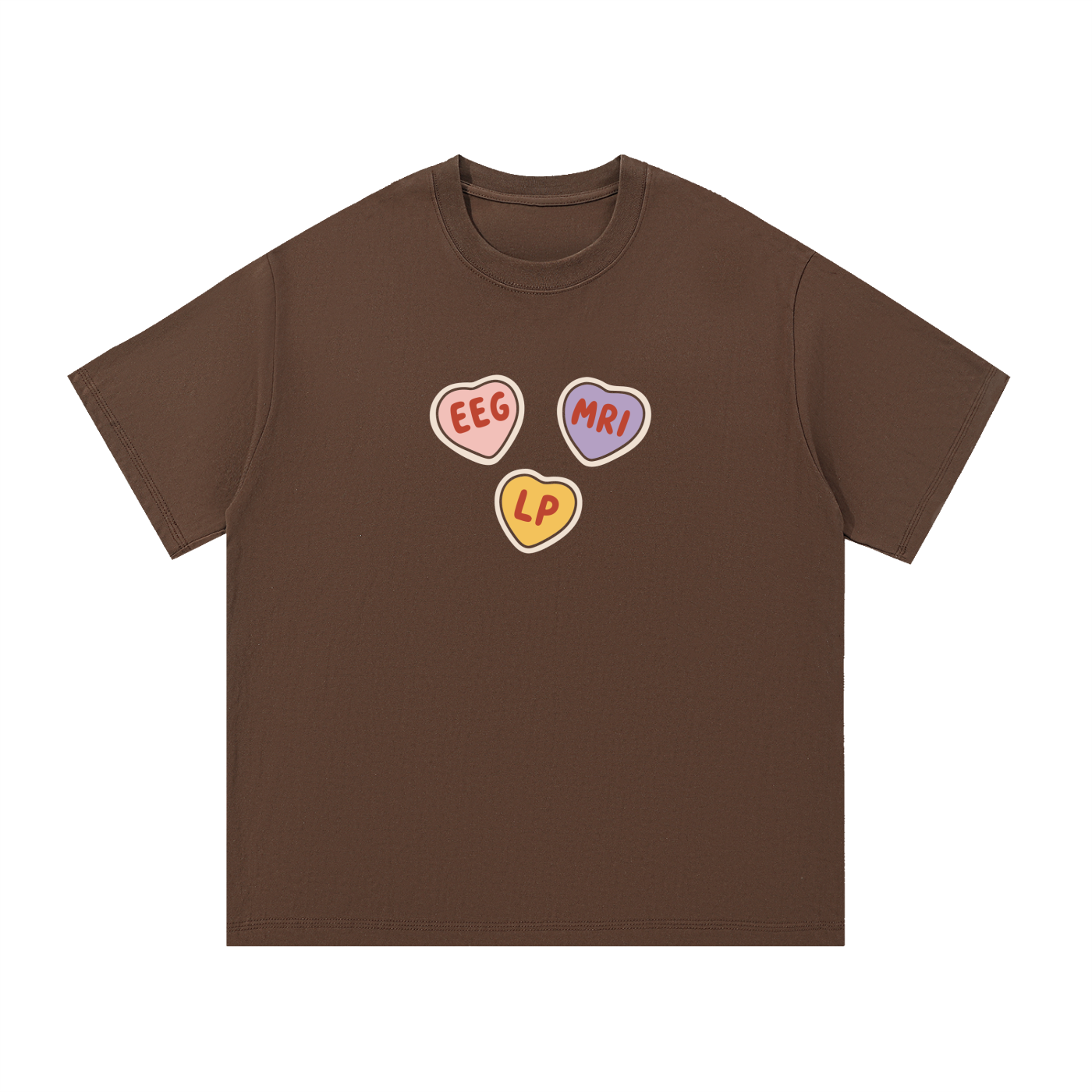 Mockup of a coffee brown cotton T-shirt with three candy hearts reading 'EEG', 'MRI' and 'LP'