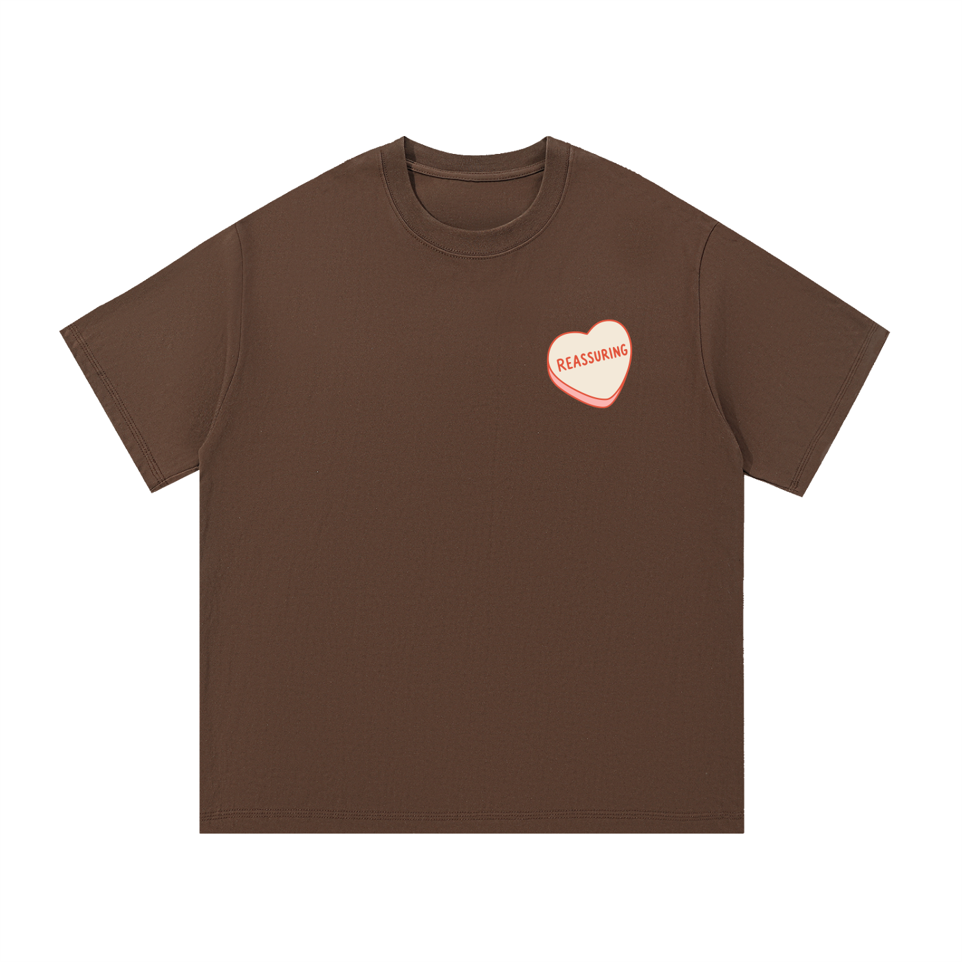 Mockup of coffee cotton T-shirt with a candy heart reading "Reassuring".