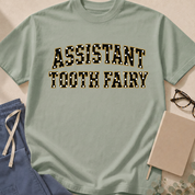 Alternate Butter colorway of the "Assistant Tooth Fairy" garment-dyed dental t-shirt