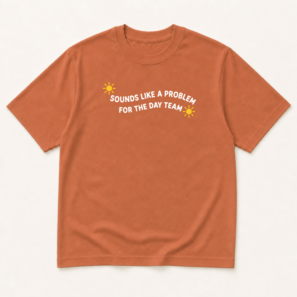 Garment-dyed unisex t-shirt printed with 'Sounds Like a Problem for the Day Team' — Hospital Medicine humor tee for Internal Medicine and Nursing professionals.