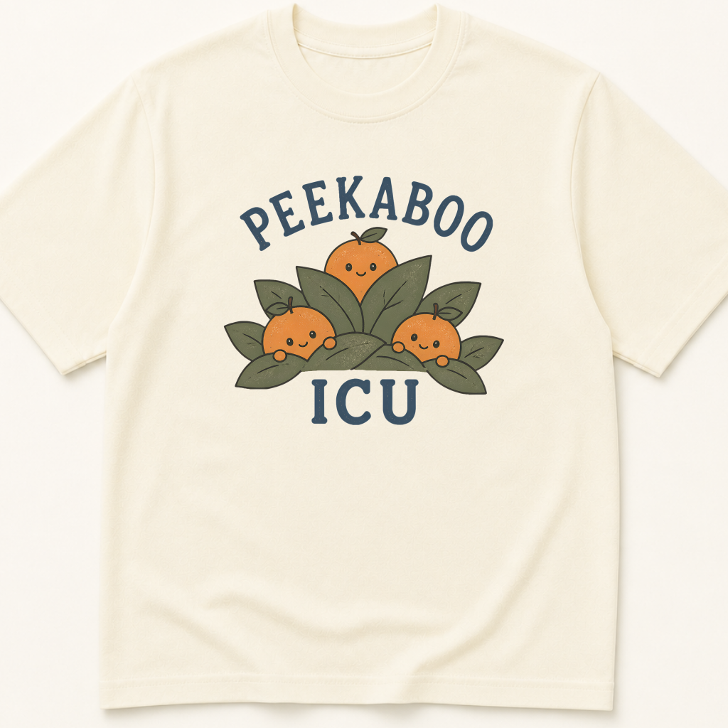 Garment-dyed unisex t-shirt featuring an illustrated Peekaboo ICU design — Critical Care humor tee for Neonatology, Nursing, and Pediatrics professionals.