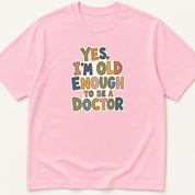 Alternate view of the 'Yes, I'm Old Enough to Be a Doctor' garment-dyed t-shirt.