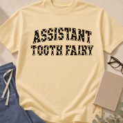 Alternate Ivory colorway of the "Assistant Tooth Fairy" garment-dyed dental t-shirt
