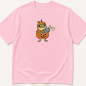 Alternate view of the illustrated Frog in Pumpkin Costume Holding Bag Mask Ventilation garment-dyed t-shirt.