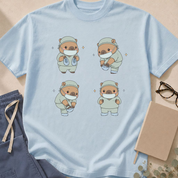 Additional colorway of the Capybara Putting on Shoe Covers garment-dyed OR t-shirt.