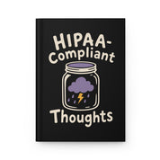 Front cover mockup of a black hardcover journal with "HIPAA-Compliant Thoughts" and a jar holding a purple storm cloud
