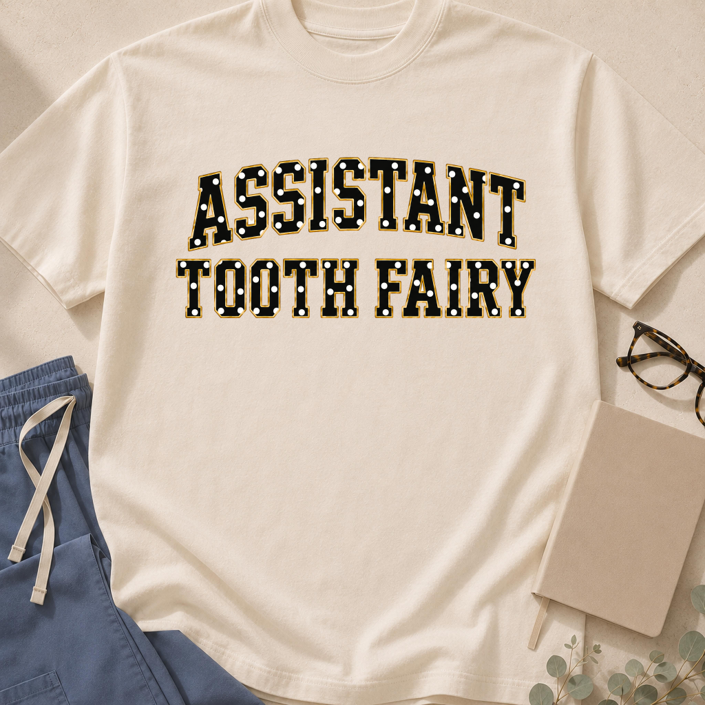 Garment-dyed unisex t-shirt printed with "Assistant Tooth Fairy" — dental humor tee for dental assistants and hygienists
