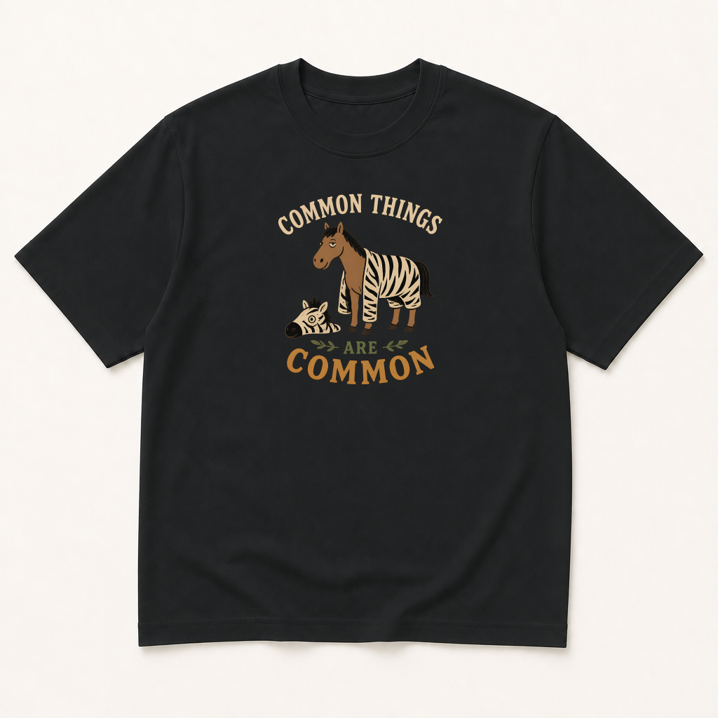 Garment-dyed unisex t-shirt printed with 'Common Things Are Common' — Family Medicine humor tee for General Medicine, Internal Medicine, and Nursing professionals.