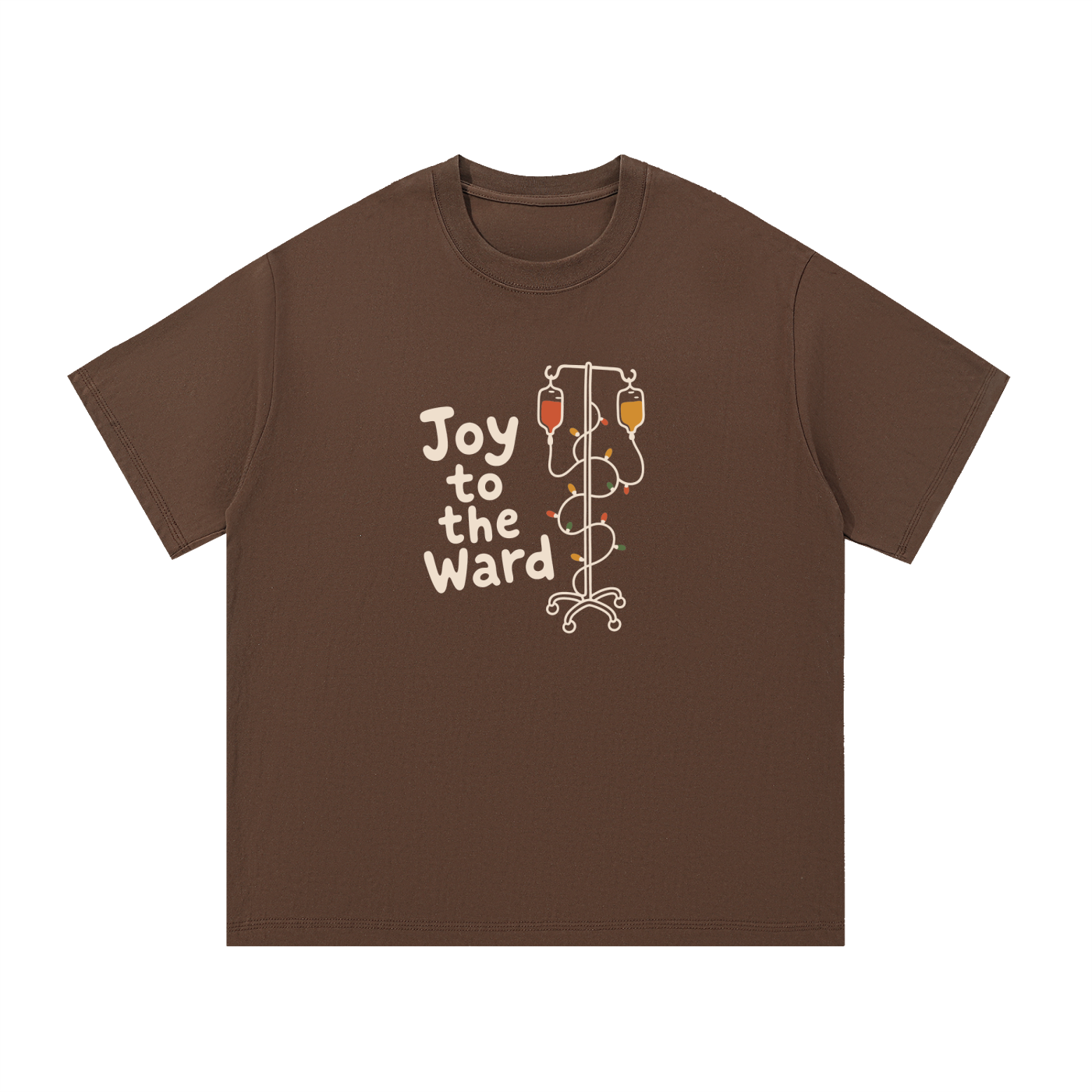Mockup of a coffee-brown cotton T-shirt with 'Joy to the Ward' beside an IV pole wrapped in holiday lights