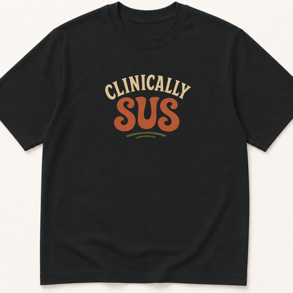 Garment-dyed unisex t-shirt printed with 'Clinically Sus' — Emergency Medicine humor tee for Family Medicine, General Medicine, and Internal Medicine professionals.