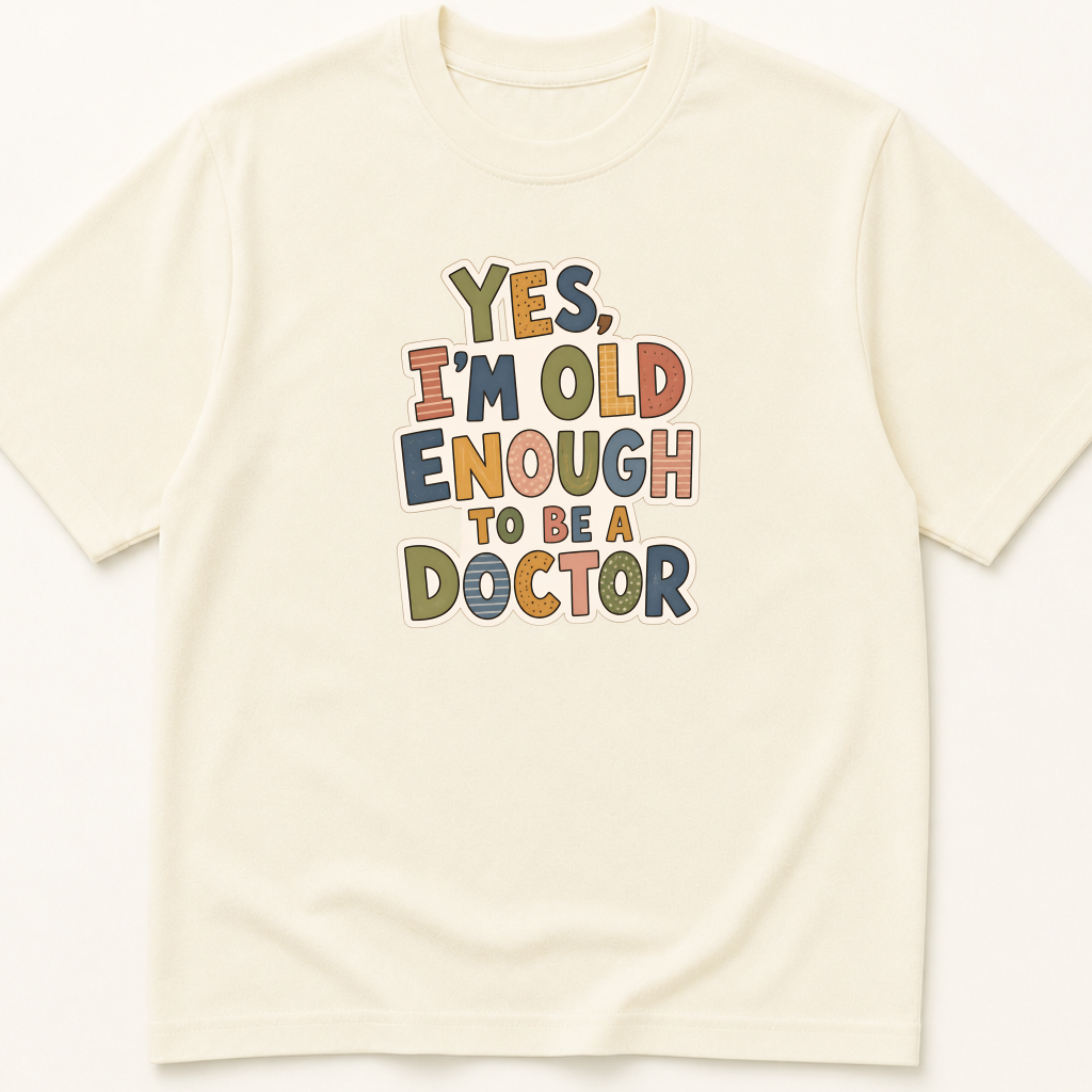 Alternate view of the 'Yes, I'm Old Enough to Be a Doctor' garment-dyed t-shirt.