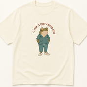 Garment-dyed unisex t-shirt featuring an illustrated It Sure Is Quiet Around Here Frog design — Critical Care humor tee for Emergency Medicine, EMS/Paramedic, and Nursing professionals.