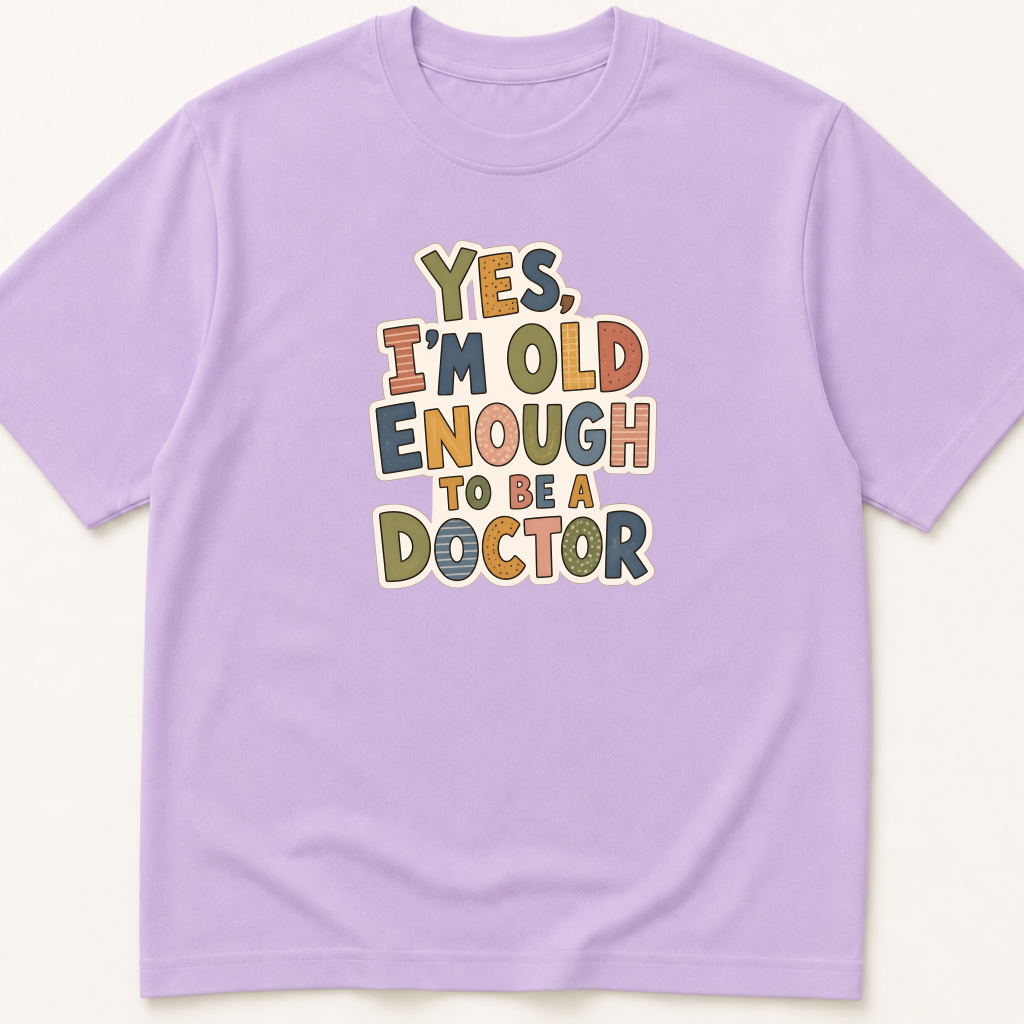 Alternate view of the 'Yes, I'm Old Enough to Be a Doctor' garment-dyed t-shirt.