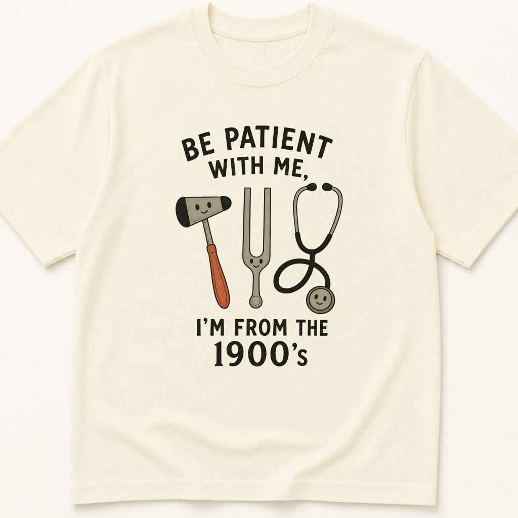 Garment-dyed unisex t-shirt featuring an illustrated Be Patient With Me I'm From the 1900s design — Family Medicine humor tee for General Medicine, Internal Medicine, and Primary Care professionals.