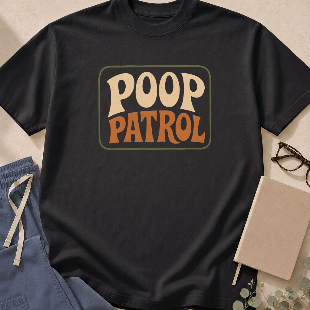 Garment-dyed unisex t-shirt printed with 'Poop Patrol Badge' — pediatric nursing humor tee for NICU and peds nurses.