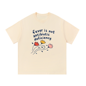 Mockup of an apricot cotton T-shirt with a floral illustration and 'fever is not antibiotic deficiency.'