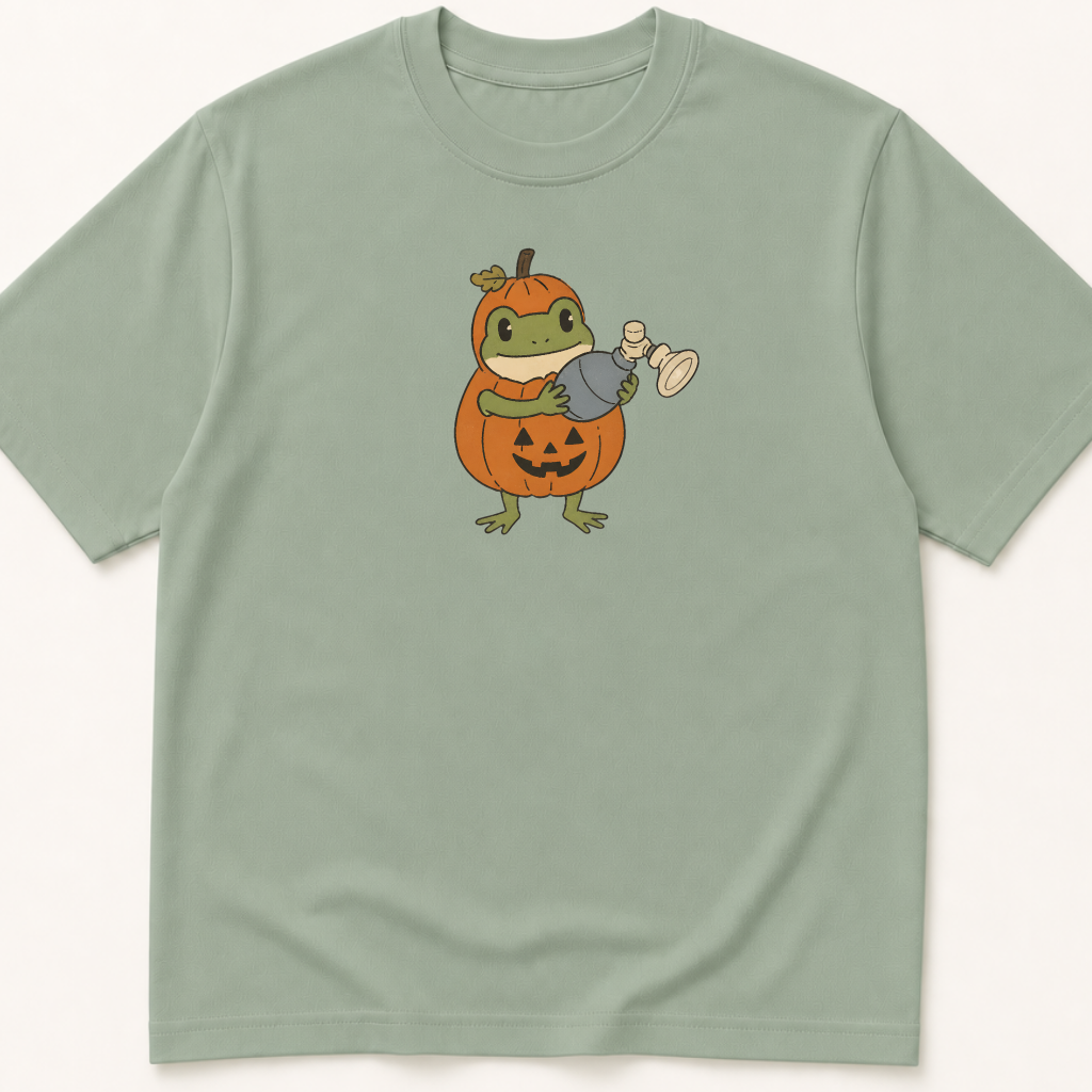 Alternate view of the illustrated Frog in Pumpkin Costume Holding Bag Mask Ventilation garment-dyed t-shirt.