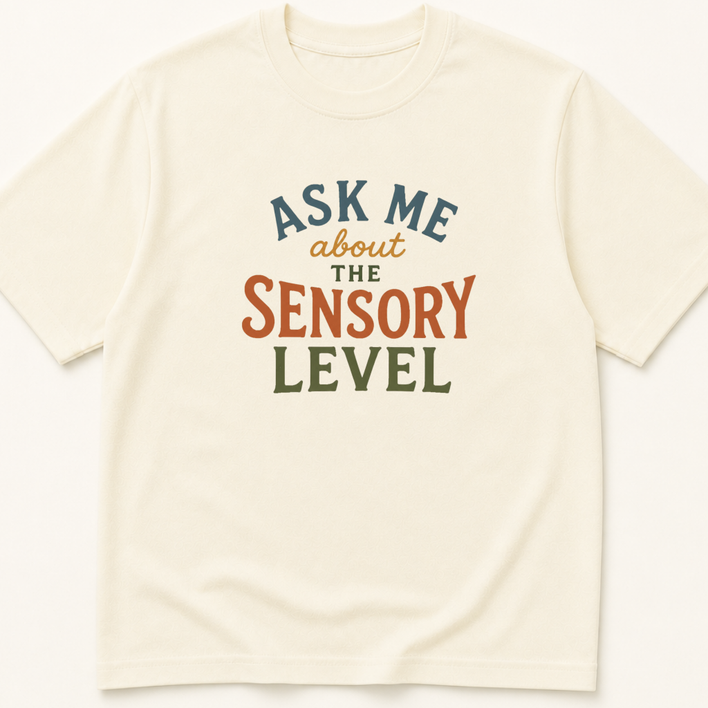 Garment-dyed unisex t-shirt printed with 'Ask Me About the Sensory Level' — Emergency Medicine humor tee for Neurology and PM&R professionals.