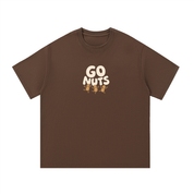 Mockup of a coffee brown cotton T-shirt with 'Go Nuts' above three dancing peanuts