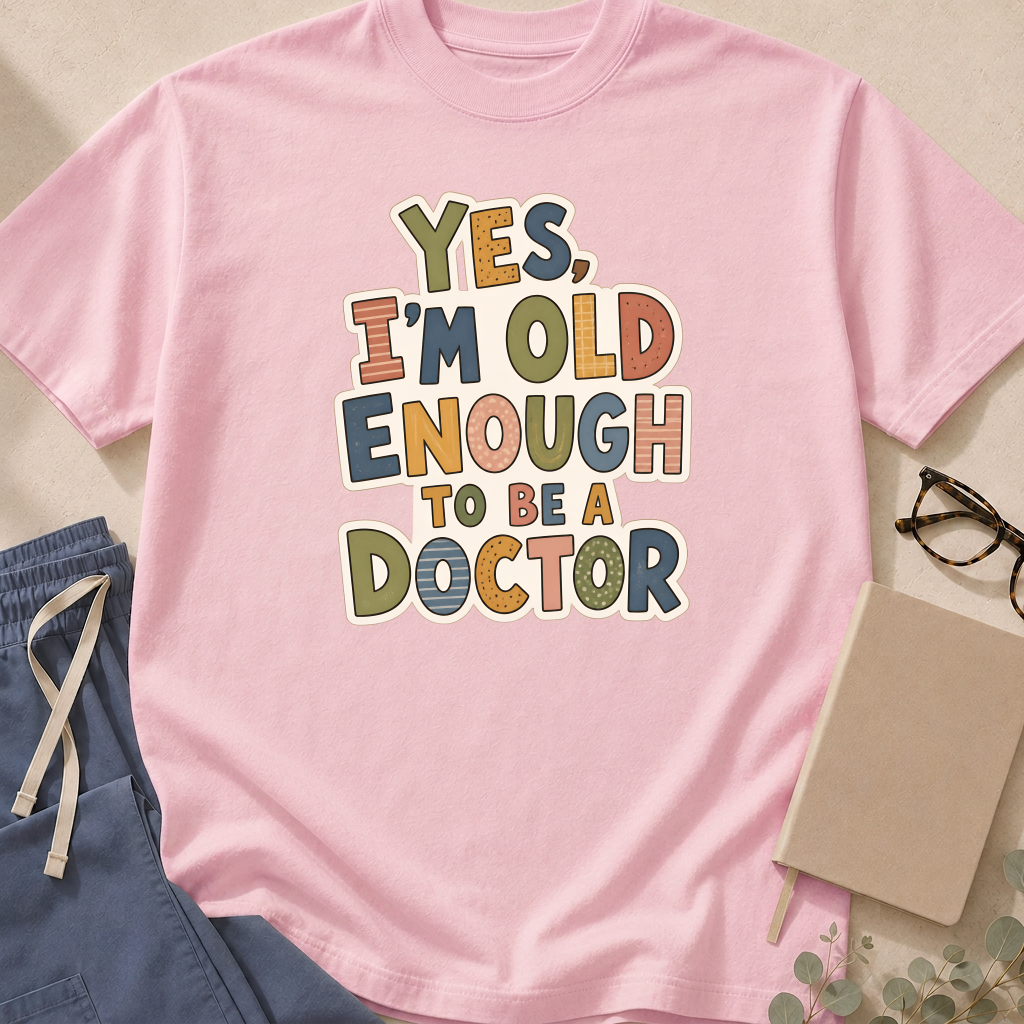 Alternate view of the 'Yes, I'm Old Enough to Be a Doctor' garment-dyed t-shirt in the Chambray colorway.