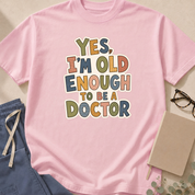 Alternate view of the 'Yes, I'm Old Enough to Be a Doctor' garment-dyed t-shirt in the Chambray colorway.
